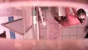  Sexy babe takes a shower and exposes herself on hidden cam