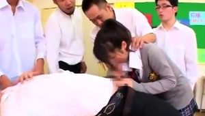  Lovely Japanese schoolgirl gets used by horny boys in class